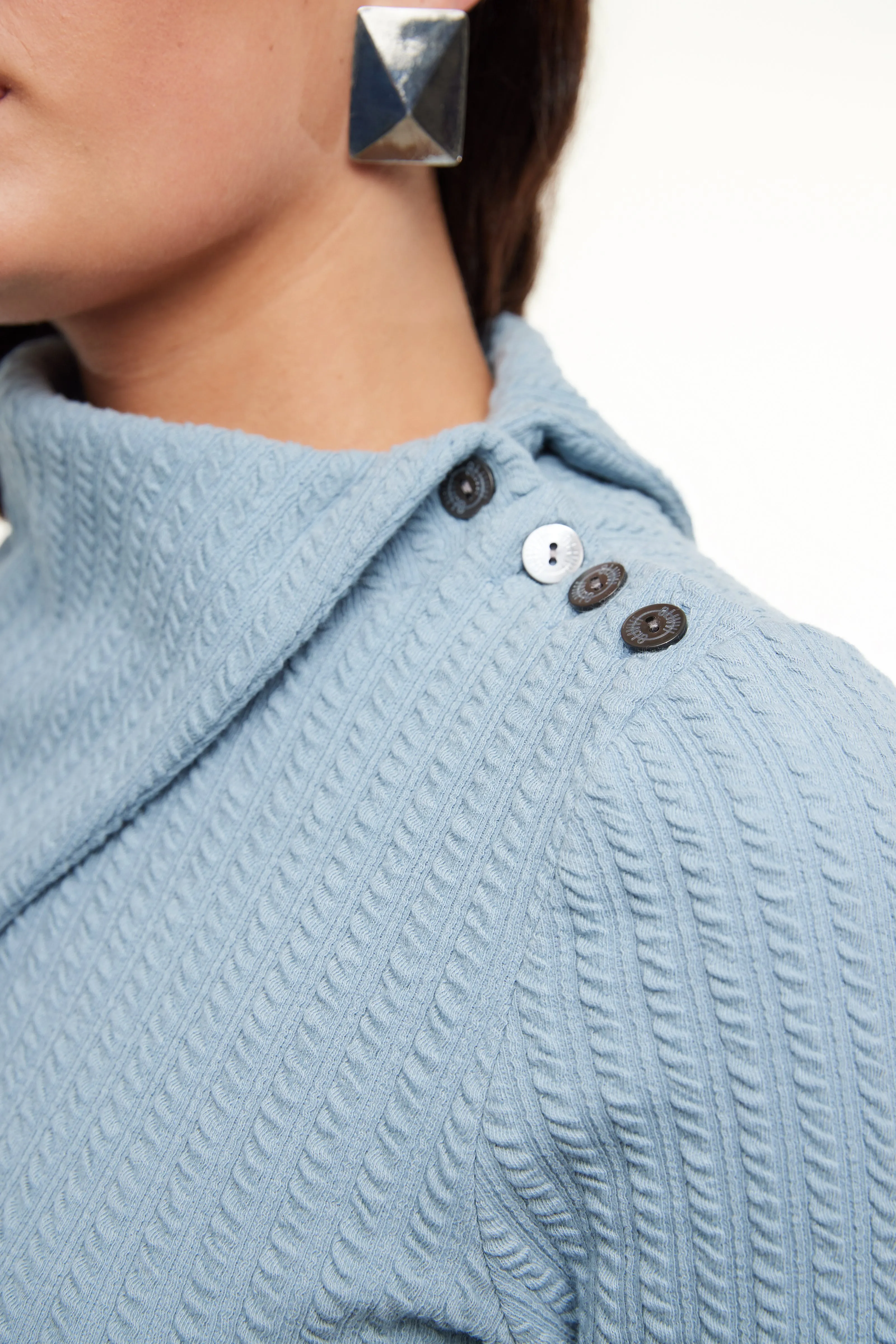 Asymmetrical Cable Turtleneck